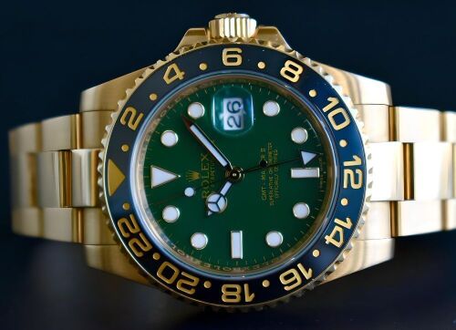 Rolex GMT Master II 18K Yellow Gold Green Dial 40mm - 2018