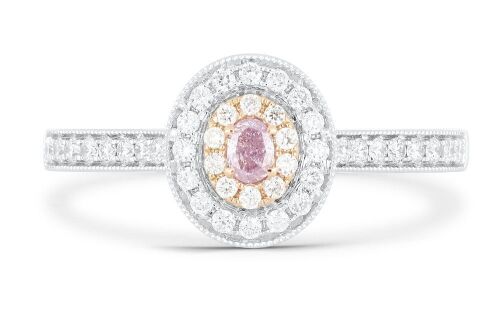 18k White & Rose gold ring set with a 0.07ct natural pink oval cut diamond surrounded by F/VS diamonds