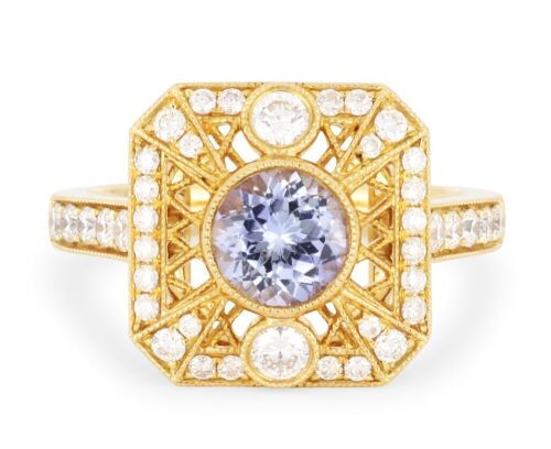 18k Yellow gold ring set with a 0.94ct natural Tanzanite and 0.63cts of Diamonds