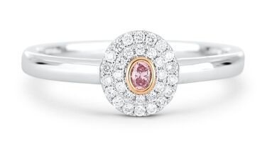 18k White gold ring set with a centre oval cut 0.058ct natural Fancy Pink Argyle Diamond