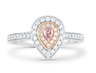 18k White gold ring set with a centre pear cut 0.067ctct natural FPP (Natural Fancy Pinkish Purple) diamond