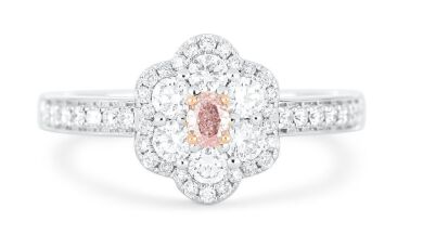 18k White and Rose gold ring set with a centre oval cut 0.088ct natural FLP Argyle diamond