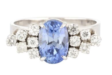 18ct White gold ring set with a 3.60ct Ceylon sapphire & 0.57cts of diamond