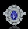 18K White gold, Tanzanite and Diamond Halo Ring