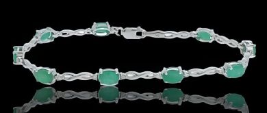 9K White Gold and Emeralds flexible link bracelet