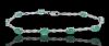 9K White Gold and Emeralds flexible link bracelet