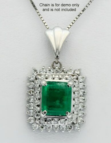 Platinum Emerald and Diamond Double Halo Pendant