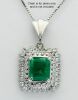 Platinum Emerald and Diamond Double Halo Pendant