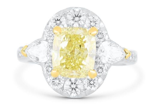 Retailer LSolid platinum ring set with a 2.24ct intense yellow cushion cut diamond surrounded by F/VS diamonds