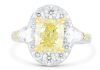 Retailer LSolid platinum ring set with a 2.24ct intense yellow cushion cut diamond surrounded by F/VS diamonds