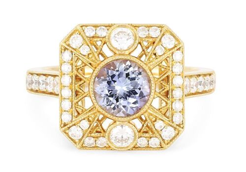 18k yellow gold ring set with a 0.94ct natural tanzanite and 0.63cts of diamonds